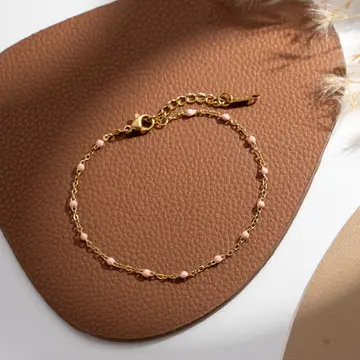 Pulsera de eslabones finos con bolitas de colores en acero dorado Modelo Elba rosa