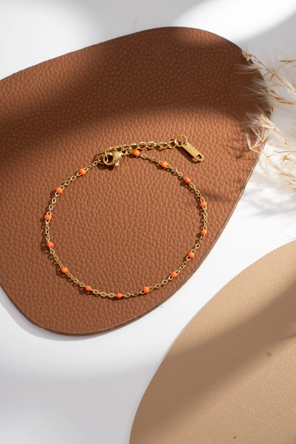 Pulsera de eslabones finos con bolitas de colores en acero dorado Modelo Elba naranja