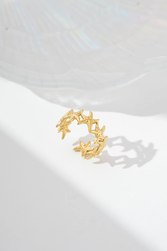 Anillo ajustable de estrellas de mar en acero – Modelo Marina