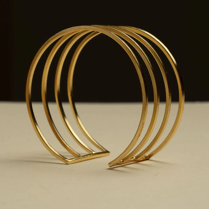 Brazalete rígido de hileras doradas – Modelo Atenea